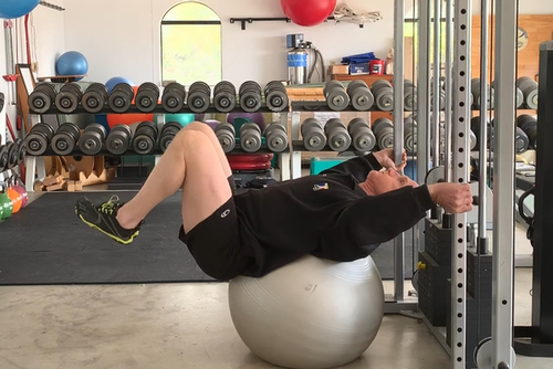 The Swiss Ball Reverse Crunch